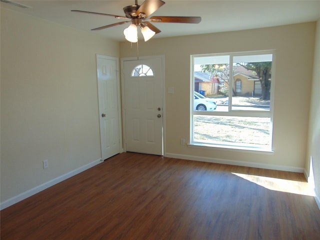 entrance foyer with ceiling fan and dark hardwood / wood-style floors