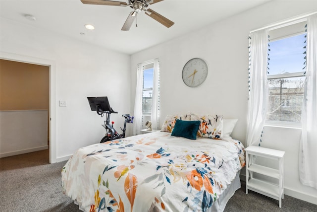 carpeted bedroom with ceiling fan