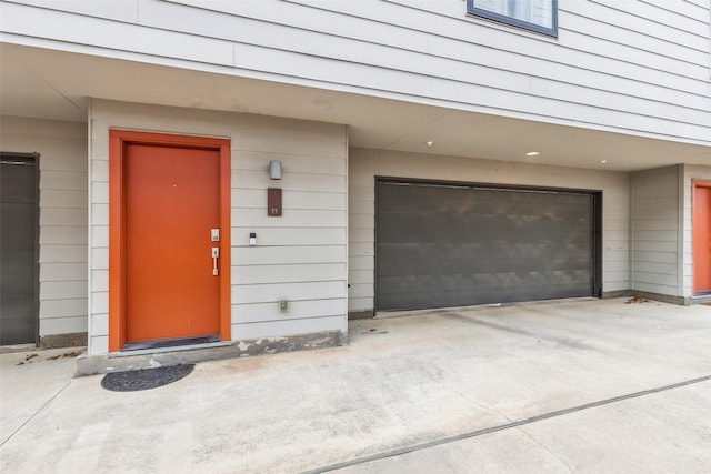 entrance to property featuring a garage