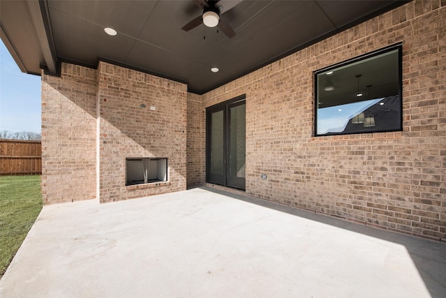 view of patio / terrace featuring ceiling fan