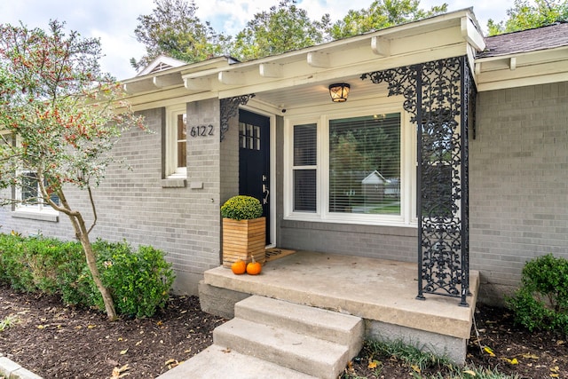 entrance to property with covered porch