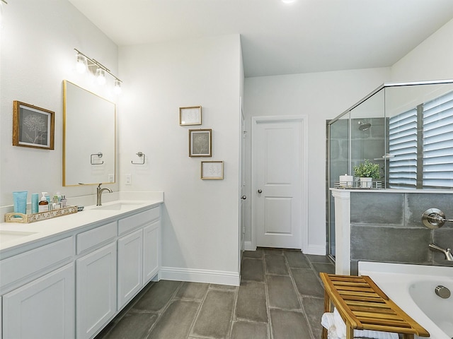 bathroom with vanity and separate shower and tub