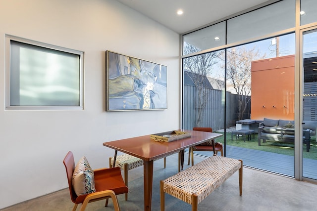 dining area featuring concrete floors