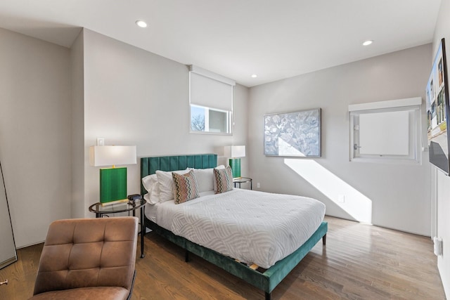 bedroom featuring hardwood / wood-style floors