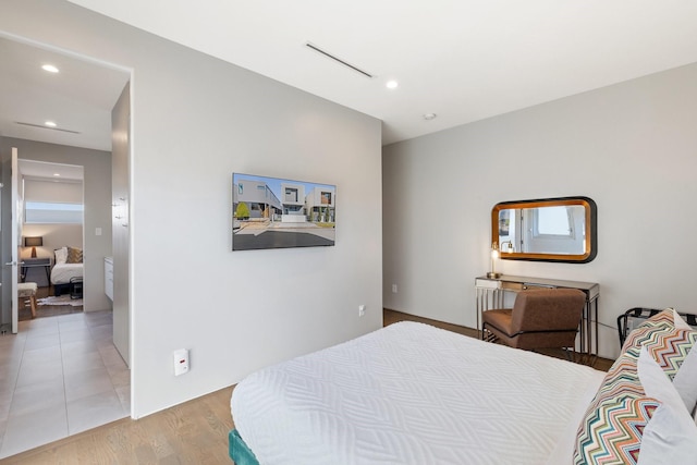 bedroom featuring light hardwood / wood-style flooring