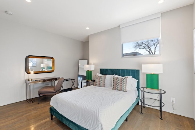 bedroom featuring wood-type flooring