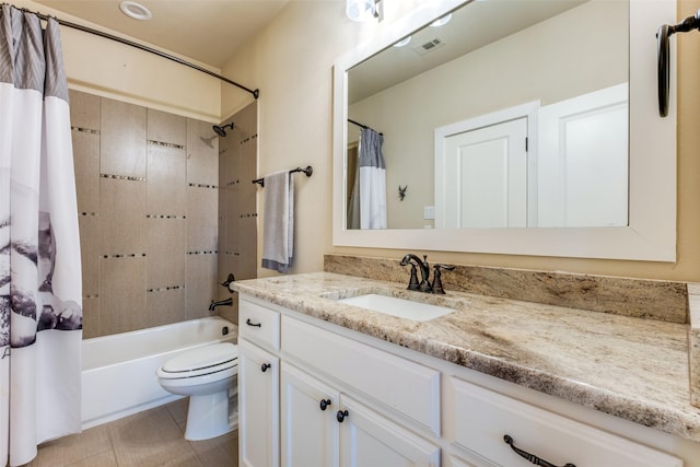 full bathroom featuring tile patterned floors, toilet, vanity, and shower / bathtub combination with curtain