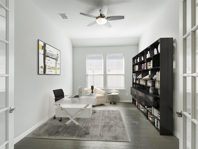 office space featuring lofted ceiling, dark wood-type flooring, a textured ceiling, and ceiling fan