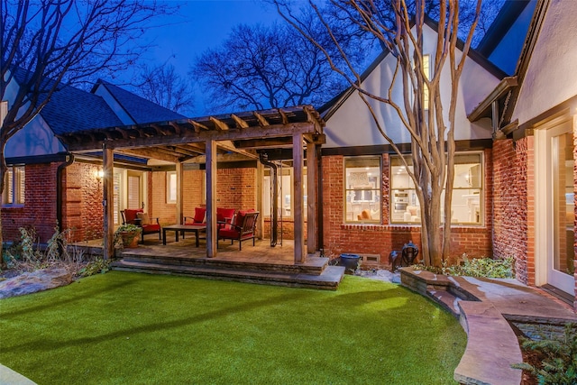 rear view of property with outdoor lounge area, a patio area, a lawn, and a pergola