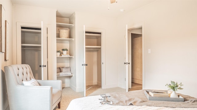 carpeted bedroom featuring ornamental molding