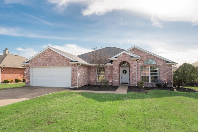 ranch-style house featuring a garage and a front lawn