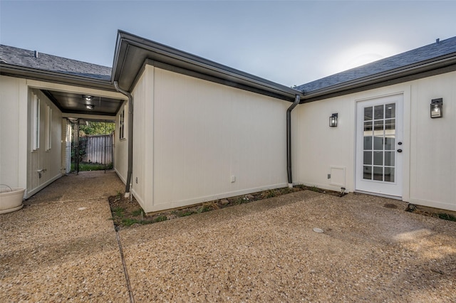 view of side of home featuring a patio area