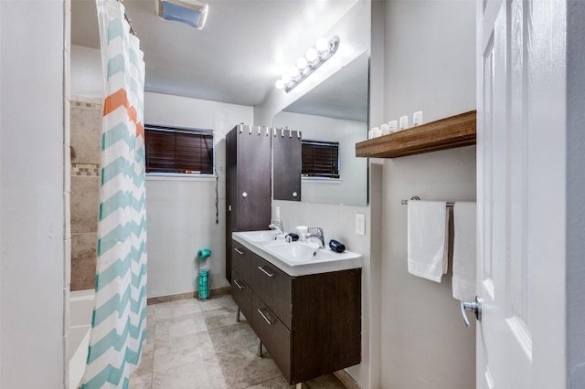 bathroom with vanity and shower / tub combo