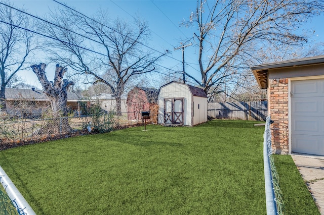 view of yard with a storage unit