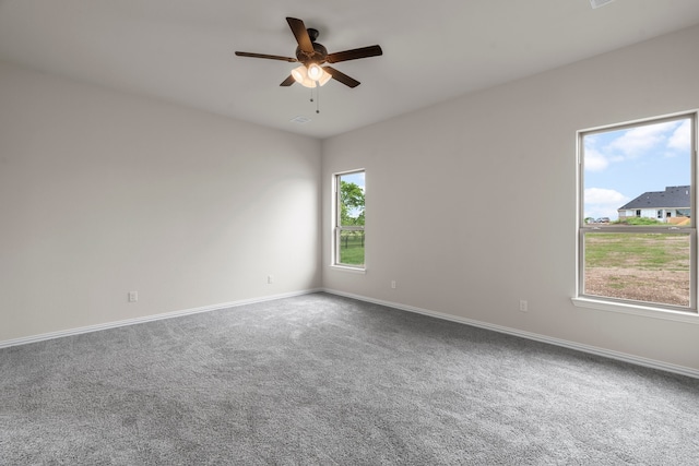 carpeted empty room with ceiling fan