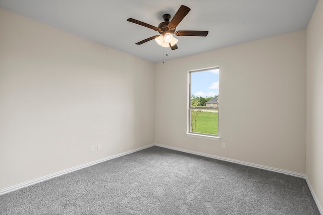 spare room with ceiling fan and carpet floors