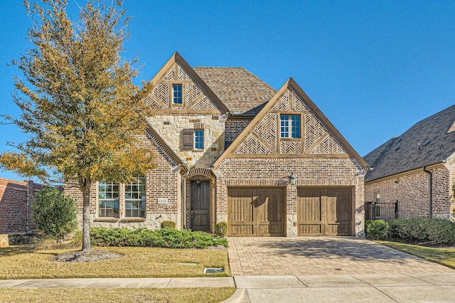 tudor house with a garage