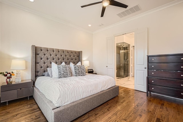 bedroom featuring ceiling fan, ornamental molding, hardwood / wood-style flooring, and ensuite bath