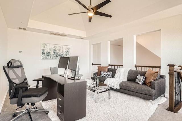 carpeted home office featuring high vaulted ceiling and ceiling fan