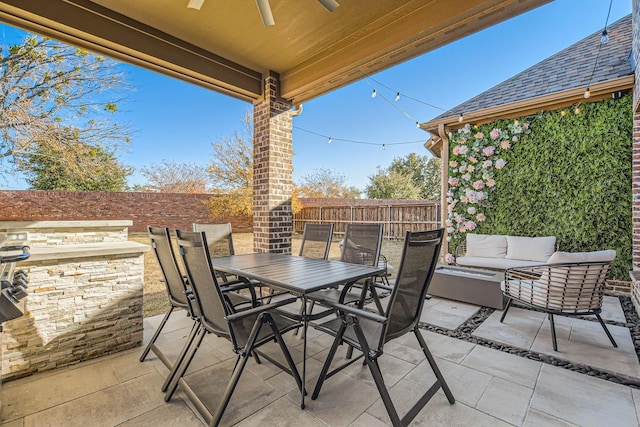 view of patio / terrace with ceiling fan and outdoor lounge area