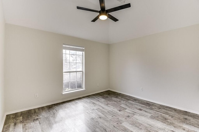 unfurnished room featuring light hardwood / wood-style floors and ceiling fan