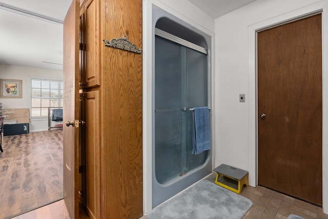 bathroom with an enclosed shower