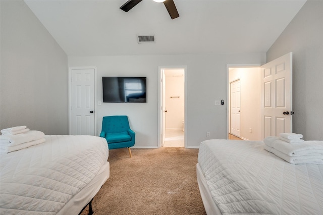 carpeted bedroom with lofted ceiling and ceiling fan