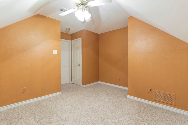 bonus room with ceiling fan, carpet, and lofted ceiling