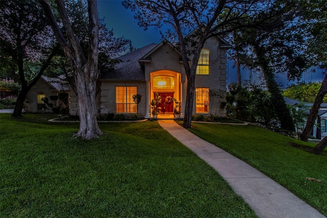 view of front of house with a front lawn