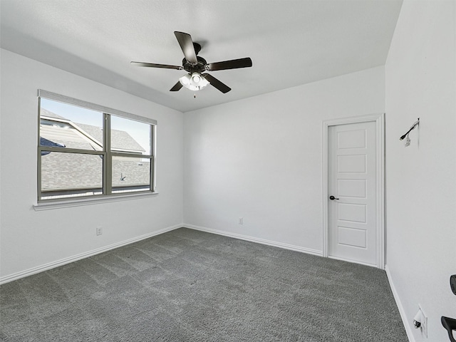 13750 Fernando Rd, Frisco, TX 75035 - spare room featuring dark carpet, ceiling fan, and baseboards