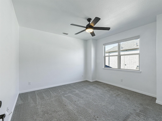 13750 Fernando Rd, Frisco, TX 75035 - empty room with dark colored carpet, ceiling fan, and baseboards