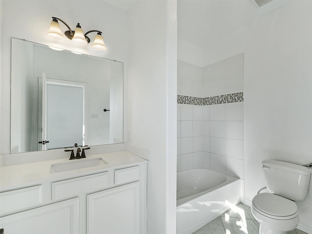 full bathroom with tiled shower / bath combo, vanity, and toilet