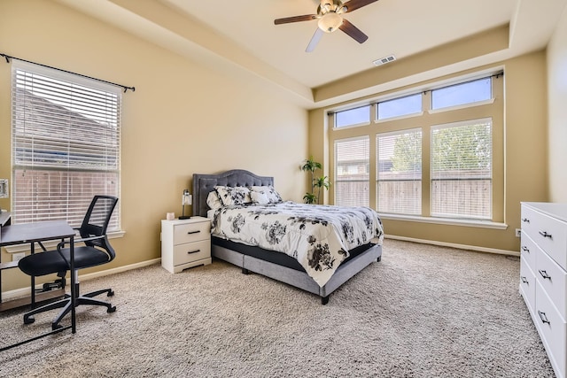 bedroom with ceiling fan and carpet floors