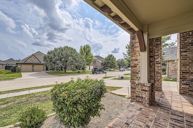 view of patio featuring a garage