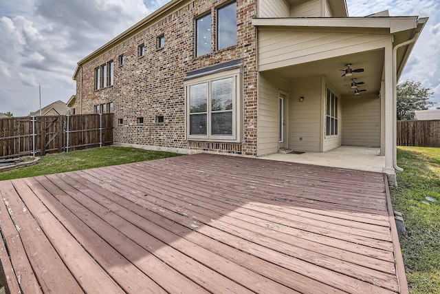 wooden terrace featuring a patio