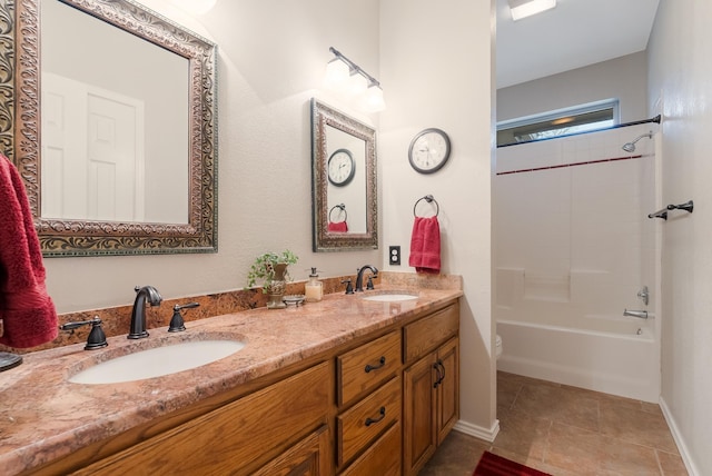 full bathroom featuring washtub / shower combination, vanity, toilet, and tile patterned flooring