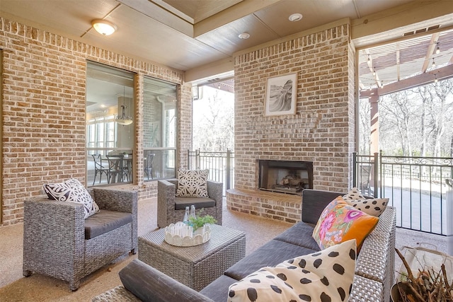 interior space with an outdoor brick fireplace