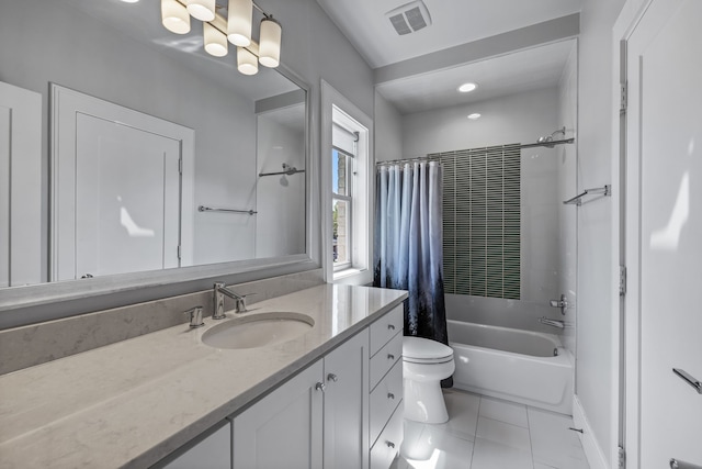 full bathroom with toilet, shower / tub combo with curtain, tile patterned floors, and vanity