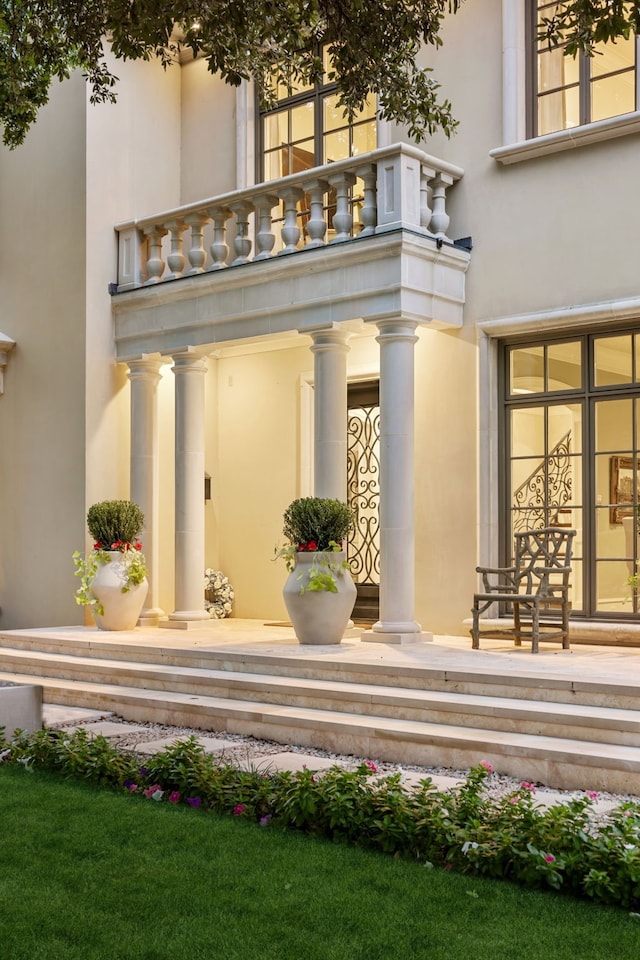 doorway to property featuring a balcony