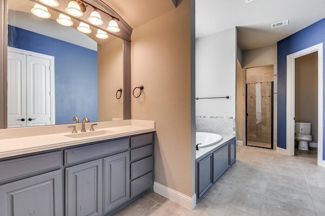 full bathroom featuring tile patterned floors, toilet, vanity, and plus walk in shower