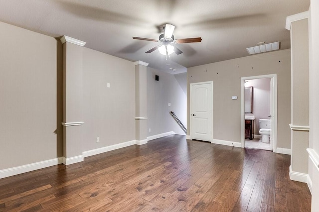 empty room with dark hardwood / wood-style floors and ceiling fan