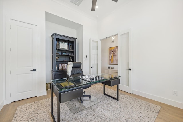 office featuring recessed lighting, visible vents, a ceiling fan, light wood-type flooring, and baseboards