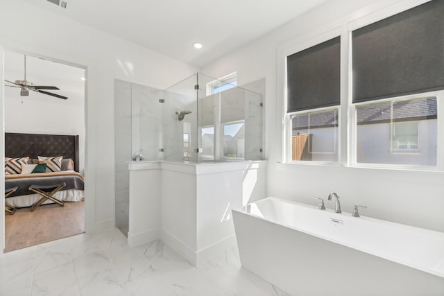 ensuite bathroom featuring ensuite bathroom, marble finish floor, a freestanding bath, a walk in shower, and recessed lighting