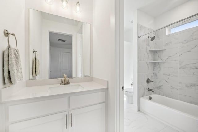 full bath with toilet, visible vents, vanity, marble finish floor, and  shower combination