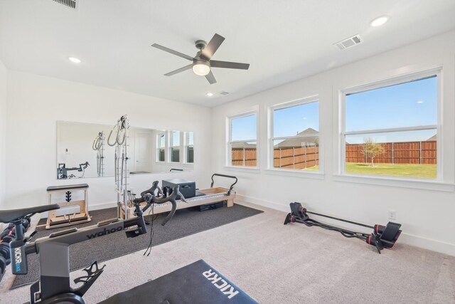 living room with light colored carpet and crown molding