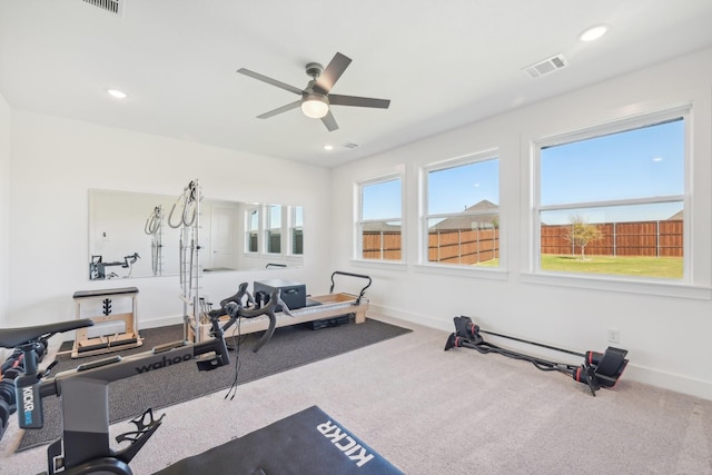 exercise room featuring carpet, recessed lighting, visible vents, ceiling fan, and baseboards