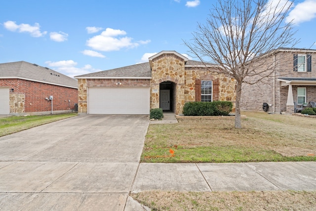 view of front of house featuring concrete driveway, stone siding, an attached garage, and a front yard