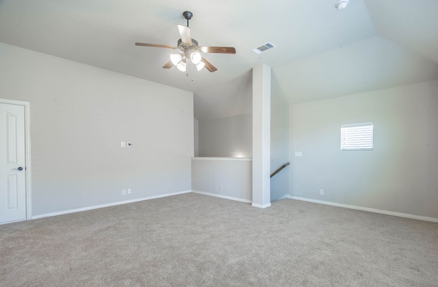 bonus room featuring vaulted ceiling, ceiling fan, and light carpet