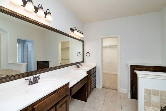 bathroom with vanity and tile patterned floors