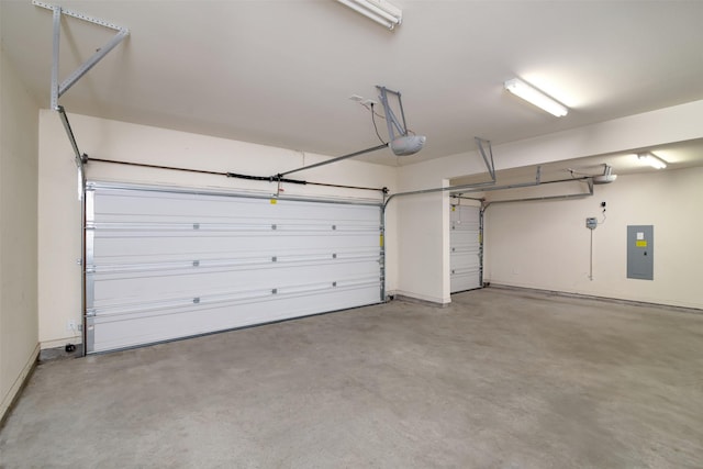 garage with electric panel and a garage door opener